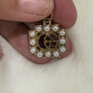 Elegant Gold Colored Gucci Zipper Pull with Faux Pearl Embellishment